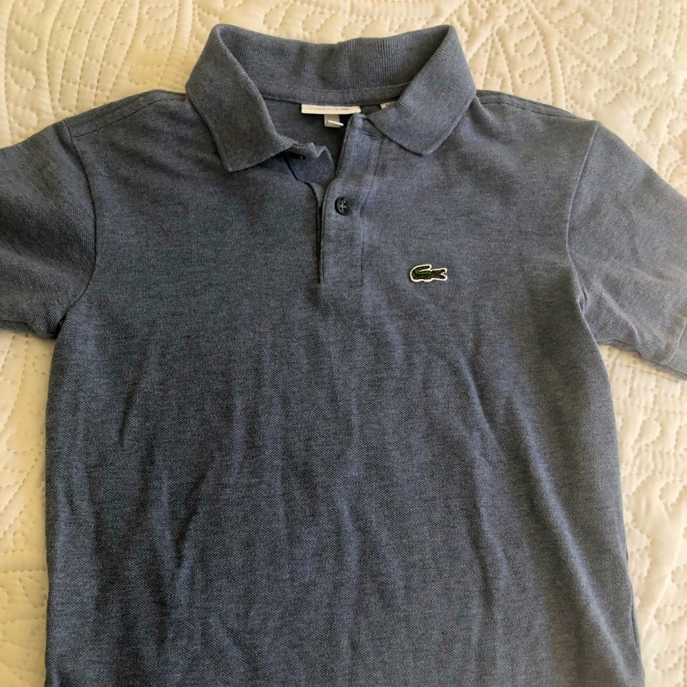 Light blue Lacoste polo. Listed size 10 but Lacoste runs small.